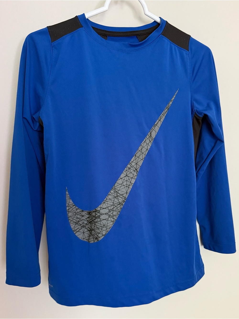 Nike Blue Long-Sleeve Athletic Top with Black Swoosh